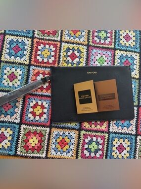 Tom Ford Wristlet with fragrance sampler. Oud Minerale and Black Orchid